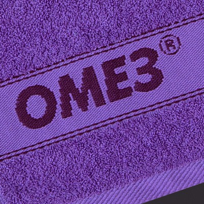 Логотип в бордюре полотенца "Омез"